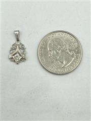 14K White Gold & Diamond Pendant Approx.10 CT. 0.8g